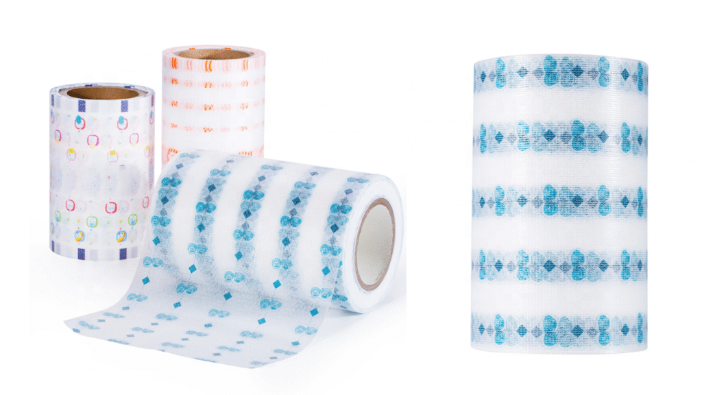 A photograph of a large, well-organized warehouse showing rows of stacked pallets of frontal tape for diapers, representing a reliable frontal tape supplier for diapers ready for bulk shipping.