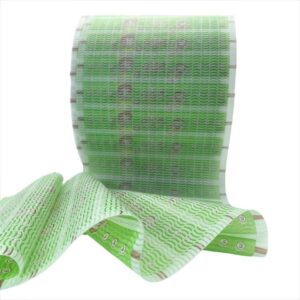 A roll of Favourite Fab's high-quality mechanical frontal tape for adult diaper making, showcasing its smooth unwinding and uniform texture.