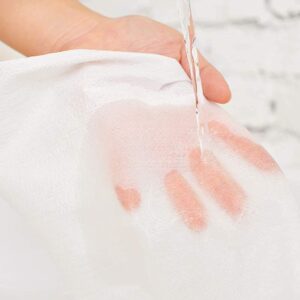 A close-up shot of a single wipe from the Mesh Embossed Spunlace Fabric product line, clearly showing the textured mesh pattern and material quality.