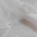 A close-up shot of a single wipe from the Pet Viscose Spunlace Nonwoven Fabric product line, clearly showing the material's softness and quality.