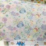 A close-up shot of Print Paper Frontal Tape for Diaper from Favourite Fab, showcasing a vibrant custom printed design on the paper surface.
