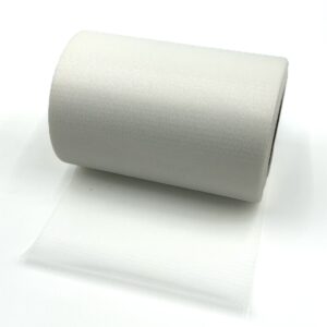 A close-up view of a sample of Soft Touch Magic Baby Diaper Frontal Tape on a white background, showing the fine texture of the nonwoven material.