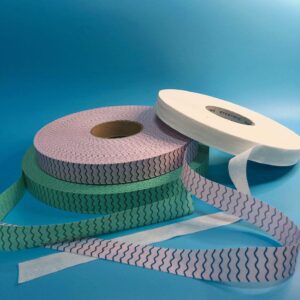 Macro view of the Negative Ion Chip for Sanitary Napkins, clearly showing the anion sanitary pad core embedded within the nonwoven material insert.