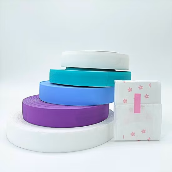 Rolls of high-quality easy tape for diaper manufacturer inventory ready for dispatch to a diaper production line.