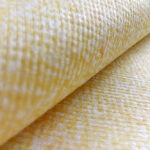Macro view of the hydrophilic embossed nonwoven fabric, clearly showing the dot embossed structure for optimal fluid management.
