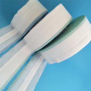 Macro view of the S Cut Side Tape Baby Diaper Raw Material, clearly showing the ergonomic S-shape diaper tape design and soft S-cut tape finish.