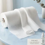 Soft white Facial Sheet Mask Nonwoven Fabric roll for skincare and cosmetic applications.